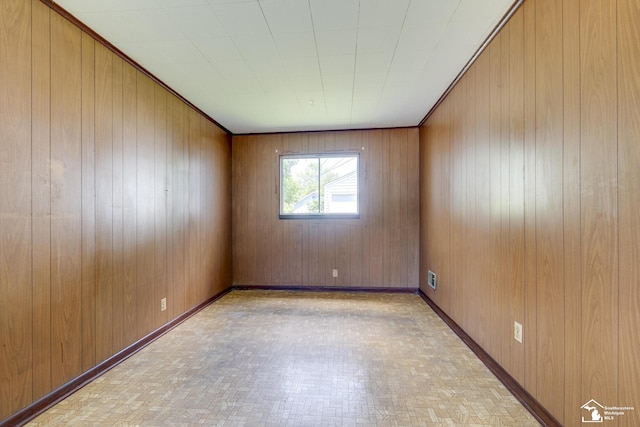 917 E 8th St, Monroe, MI 48161 - spare room with wooden walls