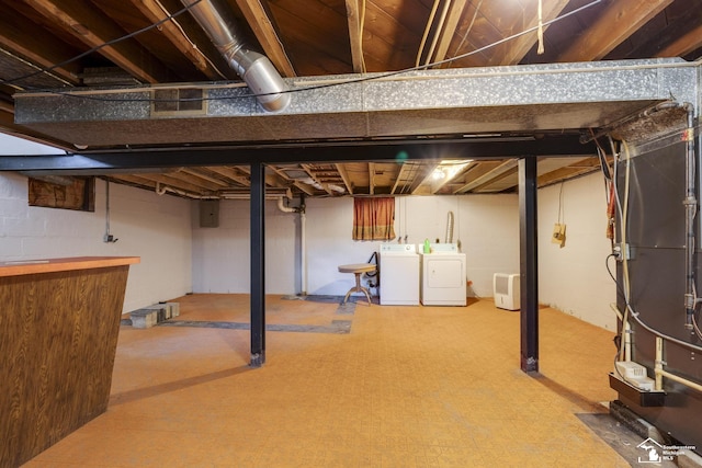 917 E 8th St, Monroe, MI 48161 - unfinished below grade area featuring washing machine and dryer and electric panel