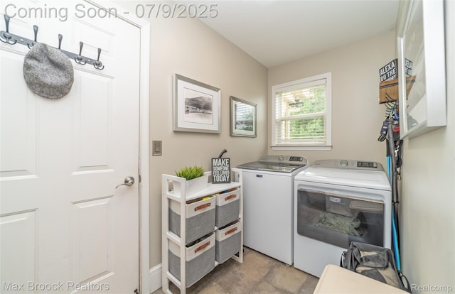 1478 Courtney Ct, Hartland, MI 48353 - laundry area featuring washer and clothes dryer and light stone finish floors