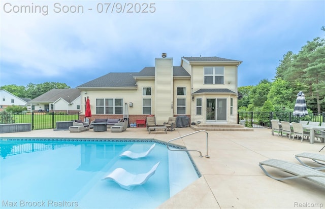 1478 Courtney Ct, Hartland, MI 48353 - view of swimming pool featuring an outdoor living space and a patio