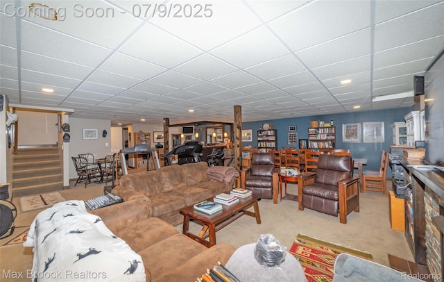 1478 Courtney Ct, Hartland, MI 48353 - living area featuring a drop ceiling, stairway, carpet floors, and recessed lighting
