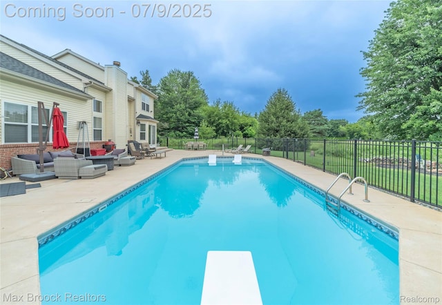 1478 Courtney Ct, Hartland, MI 48353 - view of pool with outdoor lounge area, a patio, and a diving board