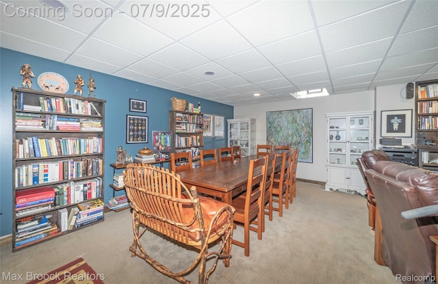 1478 Courtney Ct, Hartland, MI 48353 - dining area featuring a paneled ceiling and carpet flooring