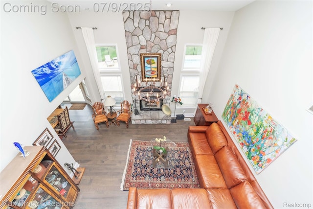 1478 Courtney Ct, Hartland, MI 48353 - living area with healthy amount of natural light, wood finished floors, and a high ceiling