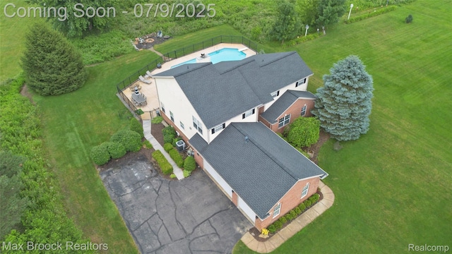 1478 Courtney Ct, Hartland, MI 48353 - view from above of property with a pool