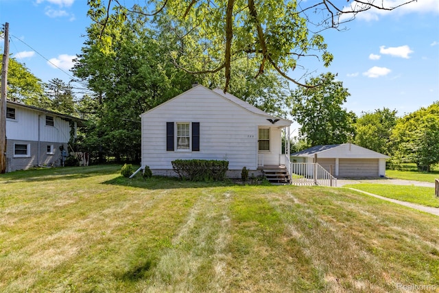 785 Tromley St, Inkster, MI 48141 - view of front of property with a garage and a front yard