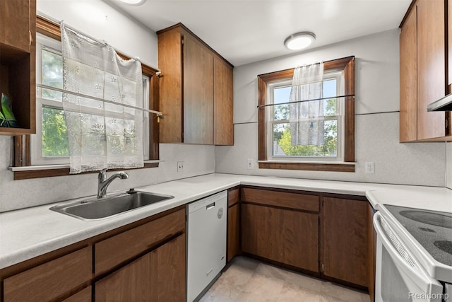 785 Tromley St, Inkster, MI 48141 - kitchen with dishwasher, electric range, light countertops, and open shelves