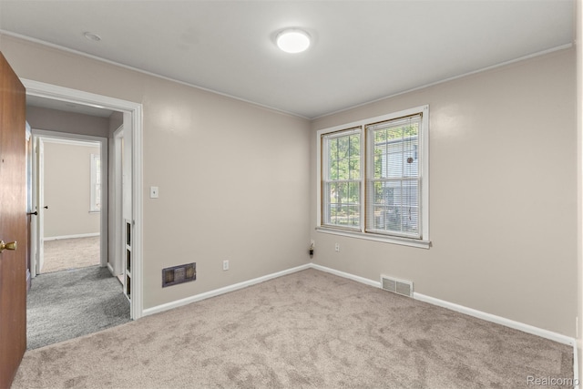 785 Tromley St, Inkster, MI 48141 - empty room with carpet floors and crown molding