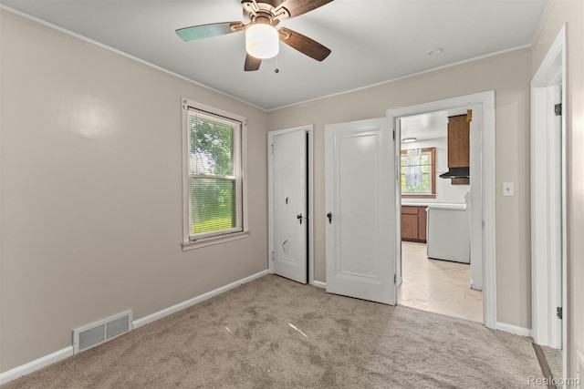785 Tromley St, Inkster, MI 48141 - unfurnished bedroom with light colored carpet, ornamental molding, and a ceiling fan