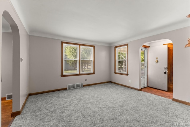 785 Tromley St, Inkster, MI 48141 - carpeted spare room featuring arched walkways and baseboards
