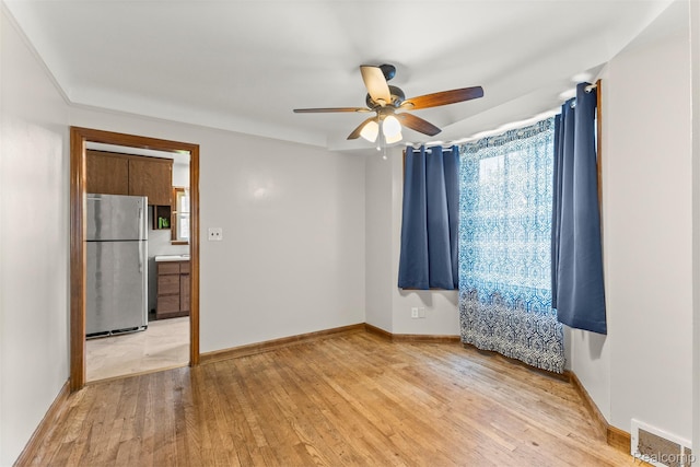 785 Tromley St, Inkster, MI 48141 - spare room with light wood-style floors, plenty of natural light, and a ceiling fan