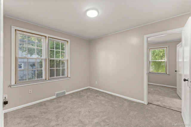 785 Tromley St, Inkster, MI 48141 - unfurnished room featuring carpet floors and ornamental molding