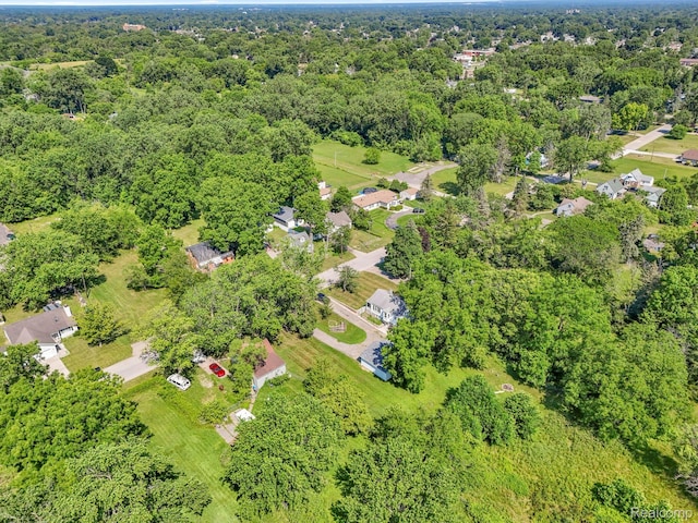 785 Tromley St, Inkster, MI 48141 - aerial view of property and surrounding area featuring a heavily wooded area