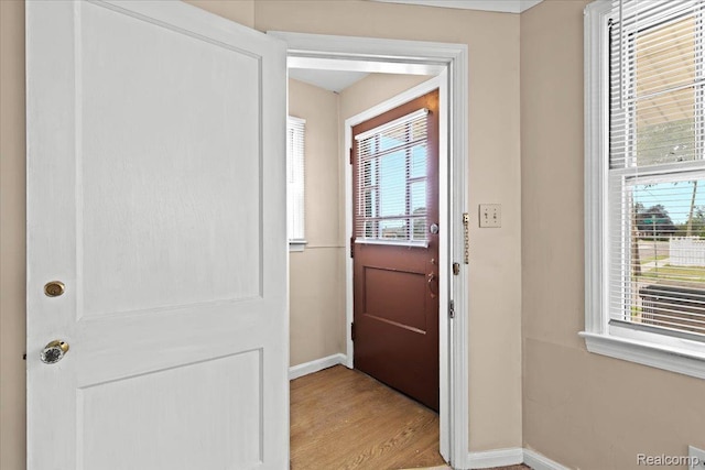 4200 Lois St, Dearborn, MI 48126 - doorway with baseboards and light wood finished floors