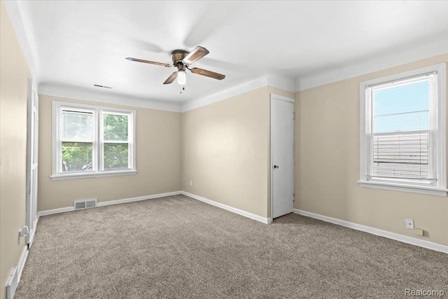 4200 Lois St, Dearborn, MI 48126 - carpeted empty room with a ceiling fan and baseboards
