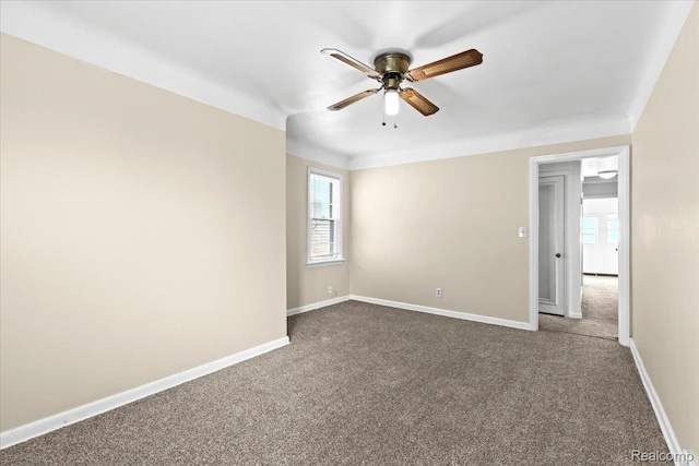 4200 Lois St, Dearborn, MI 48126 - spare room featuring dark carpet and ceiling fan
