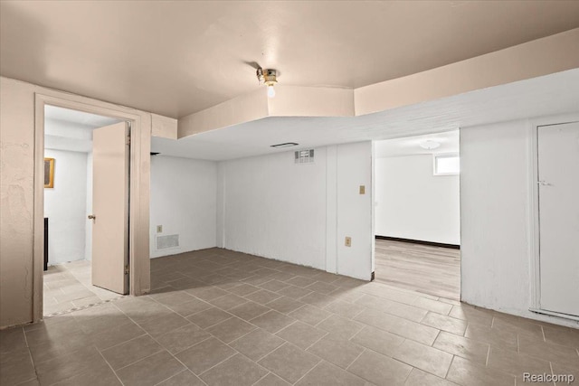 4200 Lois St, Dearborn, MI 48126 - finished basement with tile patterned flooring