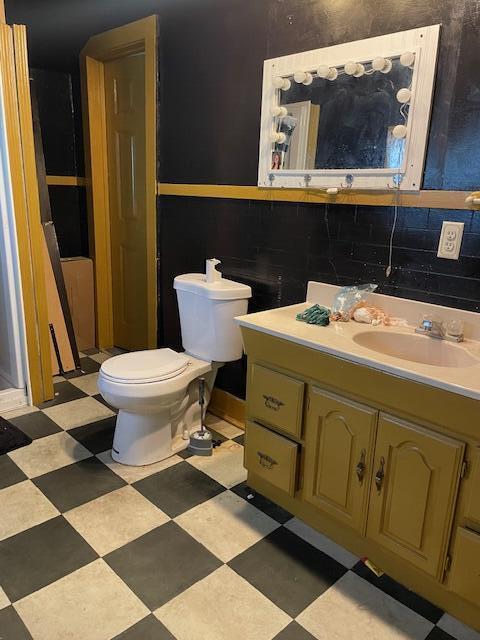 166 N Clay St, Coldwater, MI 49036 - bathroom with tile patterned floors and vanity