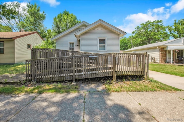 2147 Romeo St, Ferndale, MI 48220 - rear view of property featuring a wooden deck