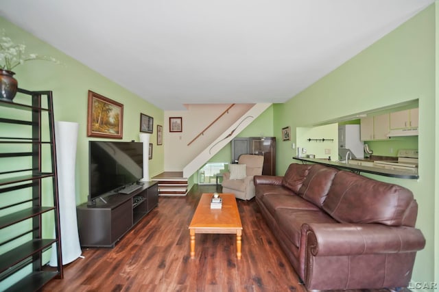 317 Clark St, Clinton, MI 49236 - living room with dark wood-style floors and stairway