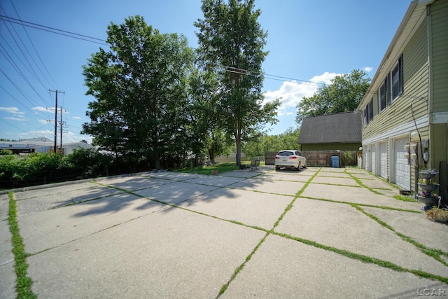 317 Clark St, Clinton, MI 49236 - view of patio featuring driveway
