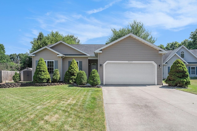 3457 Easy St, Saint Joseph, MI 49085 - single story home featuring an attached garage, a storage shed, and driveway
