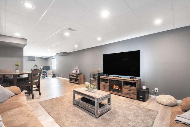 3457 Easy St, Saint Joseph, MI 49085 - living room featuring wood finished floors, a drop ceiling, and recessed lighting