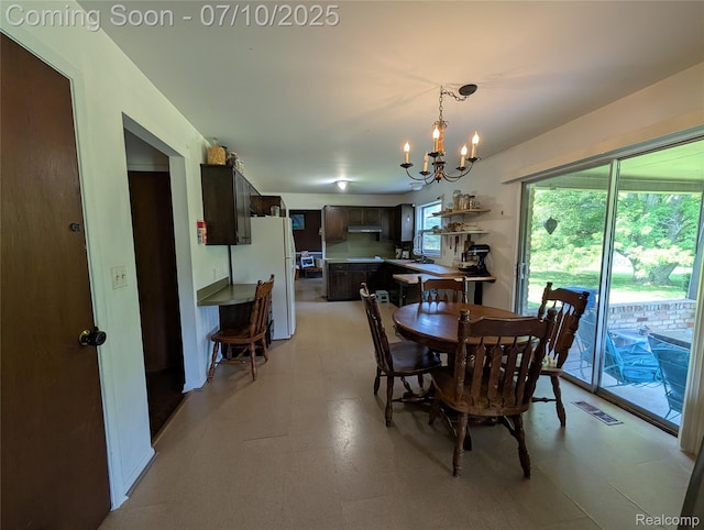 1391 Dye Krest Cir, Flint, MI 48532 - dining room with a chandelier