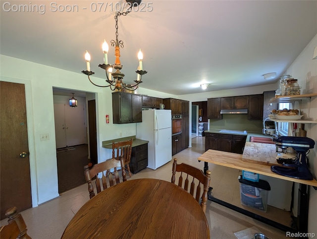 1391 Dye Krest Cir, Flint, MI 48532 - dining area with a chandelier