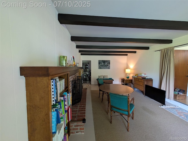 1391 Dye Krest Cir, Flint, MI 48532 - dining room featuring beam ceiling, a fireplace, and carpet floors