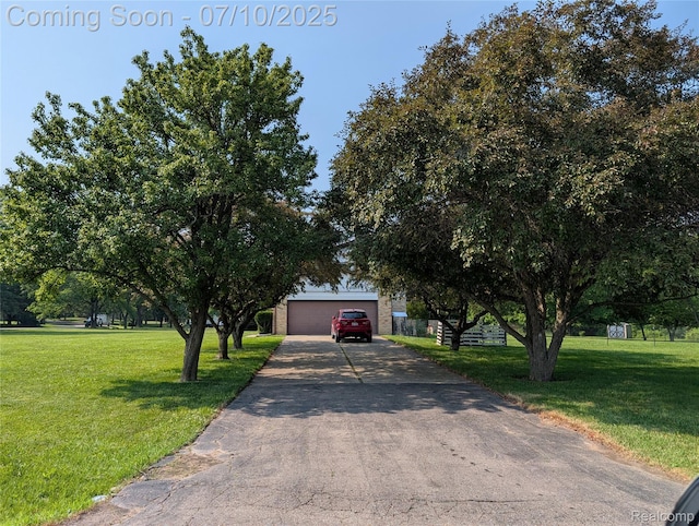 1391 Dye Krest Cir, Flint, MI 48532 - obstructed view of property featuring a front yard