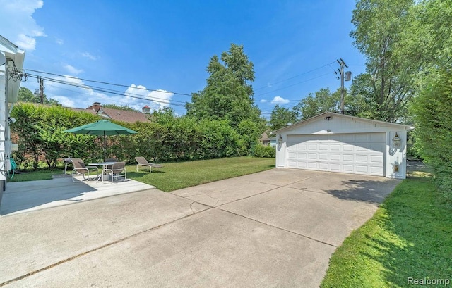 20892 Dean St, Warren, MI 48091 - view of grassy yard with a detached garage and an outdoor structure