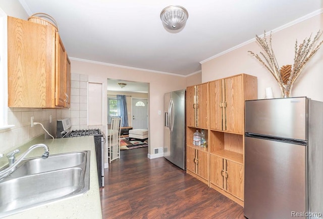 20892 Dean St, Warren, MI 48091 - kitchen featuring stainless steel appliances, dark wood finished floors, tasteful backsplash, ornamental molding, and light countertops