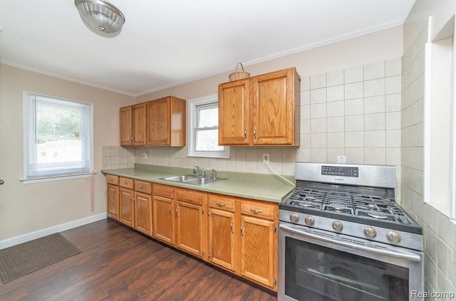20892 Dean St, Warren, MI 48091 - kitchen featuring stainless steel gas range, light countertops, dark wood-style floors, tasteful backsplash, and crown molding