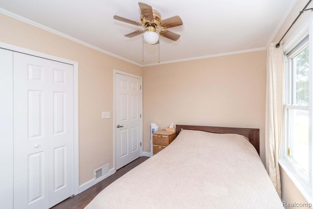 20892 Dean St, Warren, MI 48091 - bedroom featuring ornamental molding, dark wood finished floors, and a ceiling fan