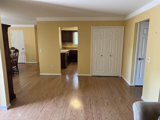 13939 Harrington Dr, Warren, MI 48088 - unfurnished living room with crown molding and wood finished floors