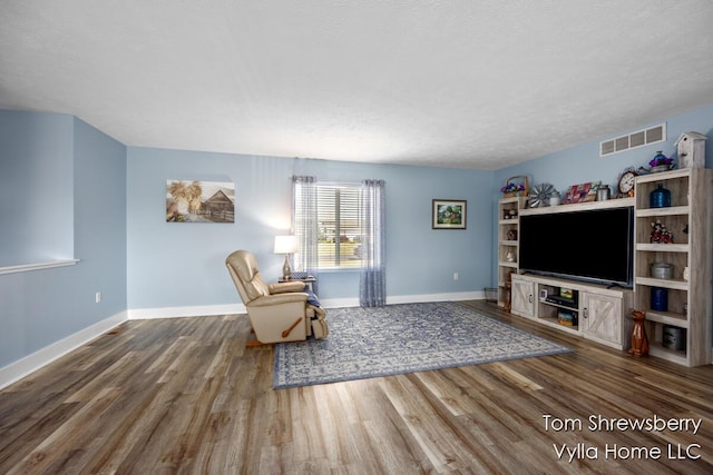 1698 Trent Ridge Ct NE, Cedar Springs, MI 49319 - living area with wood finished floors and baseboards