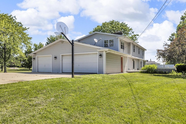 2905 E Munger Rd, Tecumseh, MI 49286 - view of home's exterior featuring a yard, an attached garage, and concrete driveway