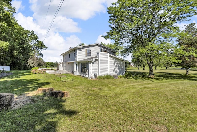 2905 E Munger Rd, Tecumseh, MI 49286 - rear view of property featuring a lawn