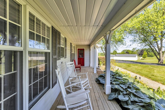 2905 E Munger Rd, Tecumseh, MI 49286 - wooden porch with a lawn