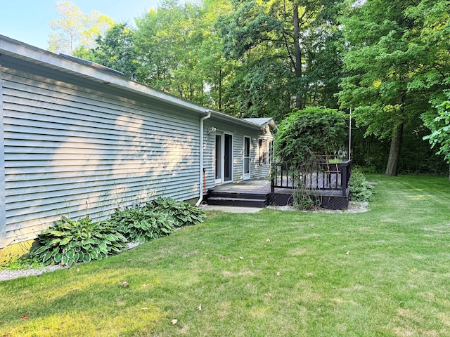 11585 190th Ave, Big Rapids, MI 49307 - view of grassy yard featuring a deck