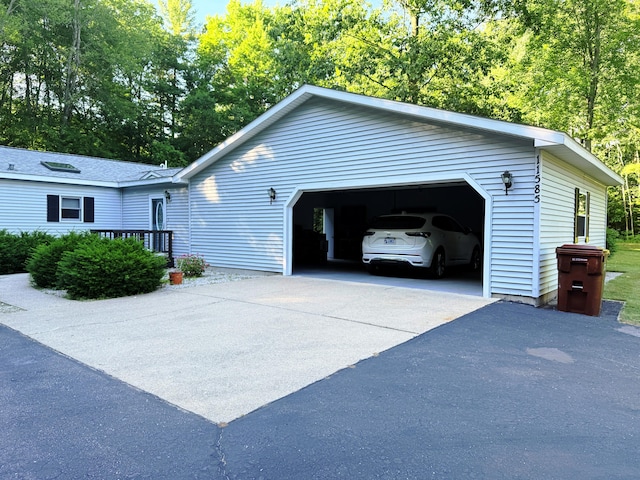 11585 190th Ave, Big Rapids, MI 49307 - view of side of property with a detached garage