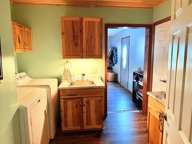 11585 190th Ave, Big Rapids, MI 49307 - washroom with cabinet space, separate washer and dryer, and dark wood finished floors