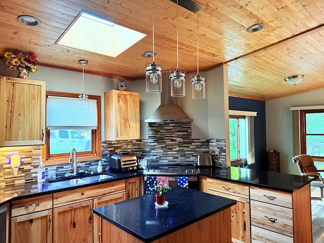 11585 190th Ave, Big Rapids, MI 49307 - kitchen featuring a skylight, a peninsula, dark countertops, stainless steel range, and wooden ceiling