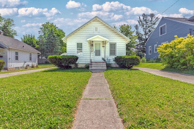1234 Diamond Ave NE, Grand Rapids, MI 49505 - view of front of property with a front lawn
