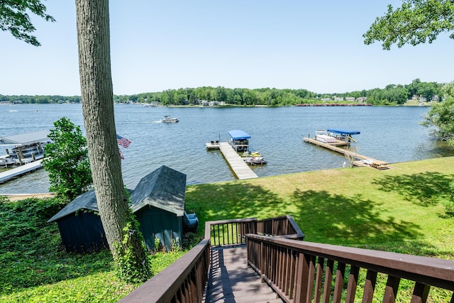 5680 Woodland Ave, Watervliet, MI 49098 - dock area featuring a water view and a lawn