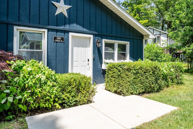 5680 Woodland Ave, Watervliet, MI 49098 - doorway to property featuring board and batten siding