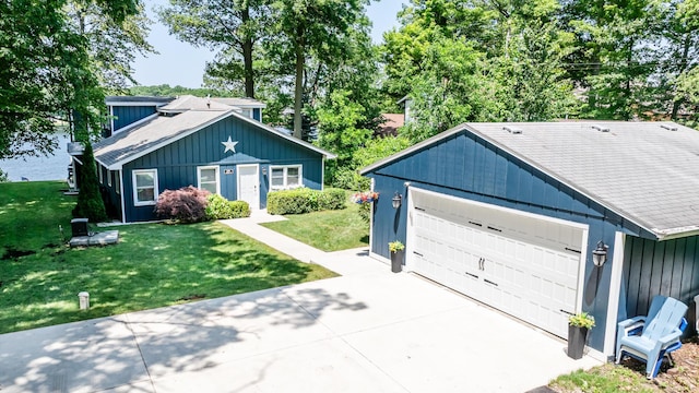 5680 Woodland Ave, Watervliet, MI 49098 - view of front of home featuring a front lawn, a garage, and board and batten siding