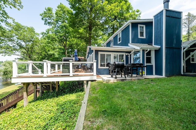 5680 Woodland Ave, Watervliet, MI 49098 - back of house featuring a deck, a yard, stairs, and a patio