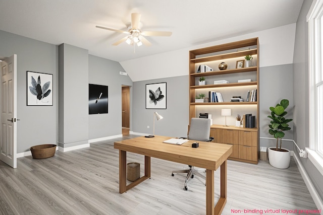 22121 Bedford Rd N, Battle Creek, MI 49017 - home office featuring ceiling fan, light wood-style floors, and lofted ceiling